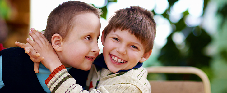 two boys smiling