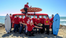 Pizza Man Dan's team at the beach